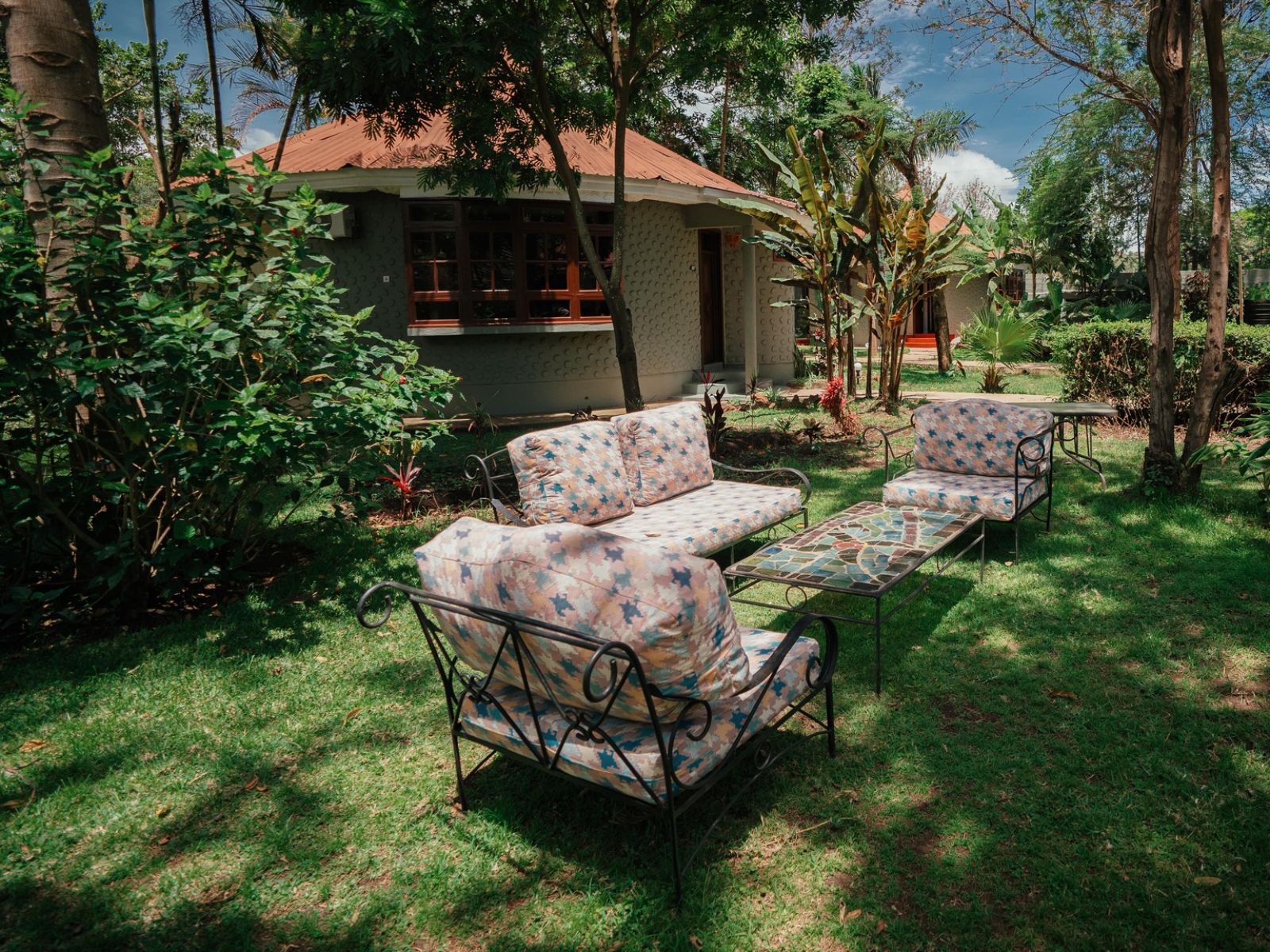Rondreis Tanzania, Arusha, Planet Lodge, tuin