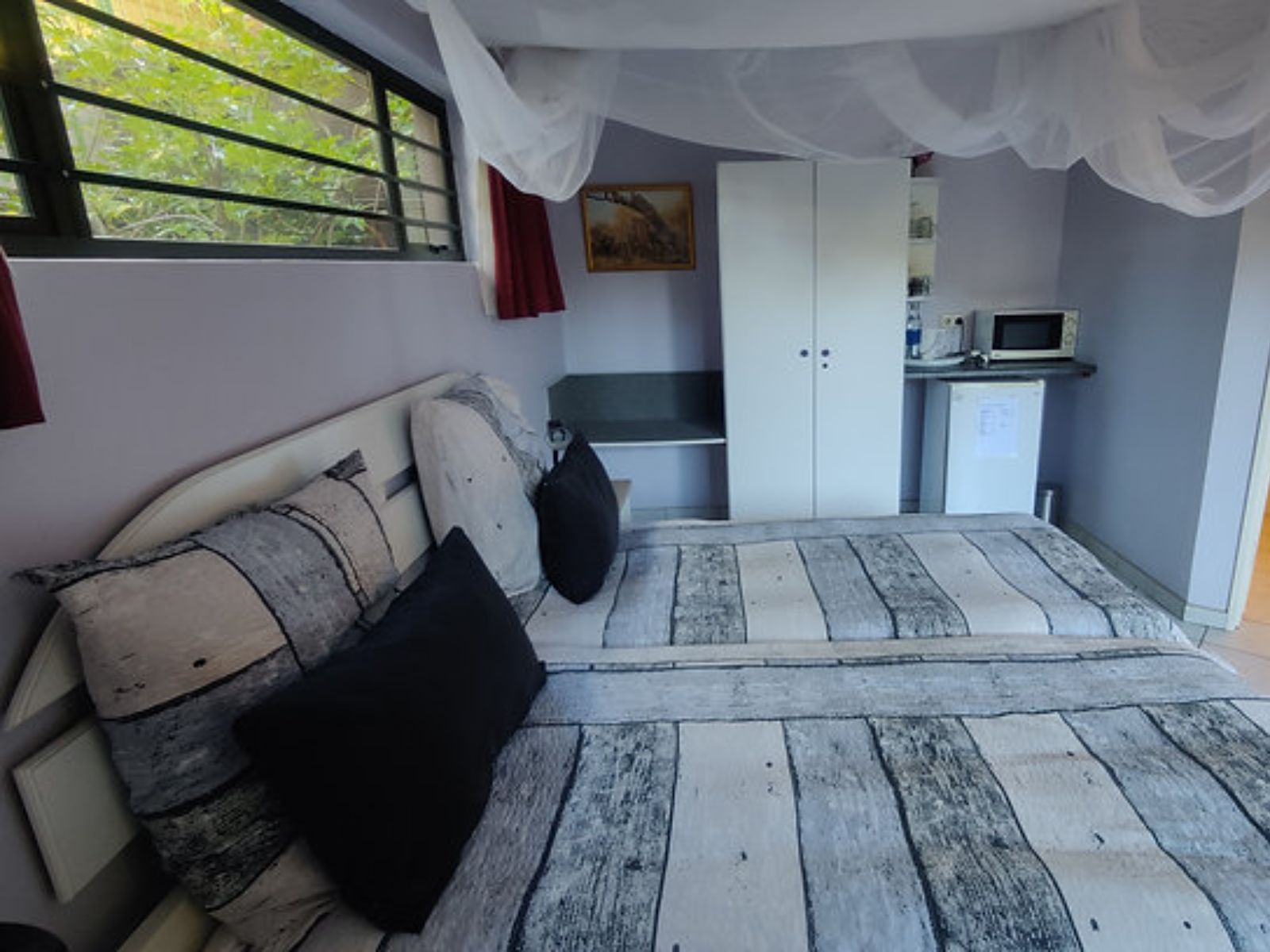 Rondreis Namibië, Windhoek, Maison Ambre, tweepersoonsbed