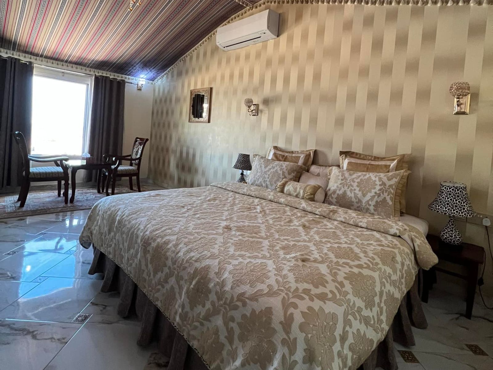 Rondreis Oman, Ras Al Hadd, Turtle Beach Resort, tweepersoonskamer met airco