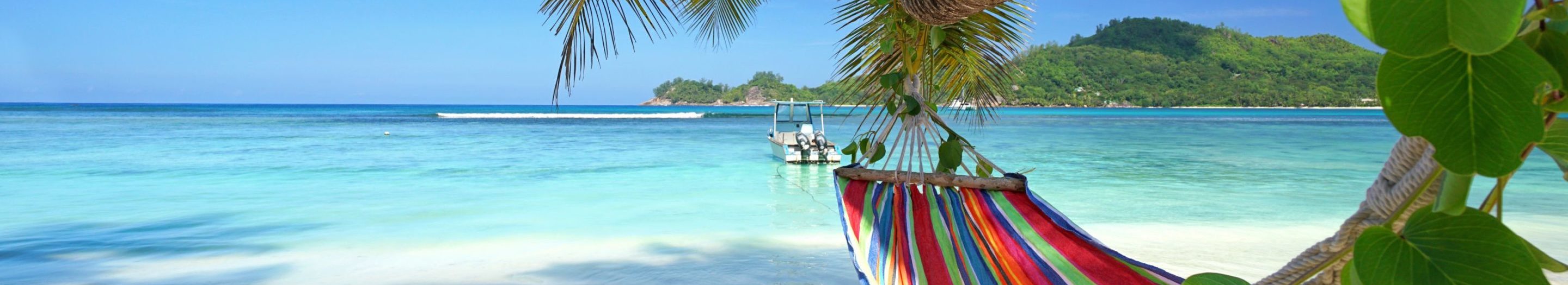 Rondreis Seychellen, Mahé, hangmat aan een palmboom