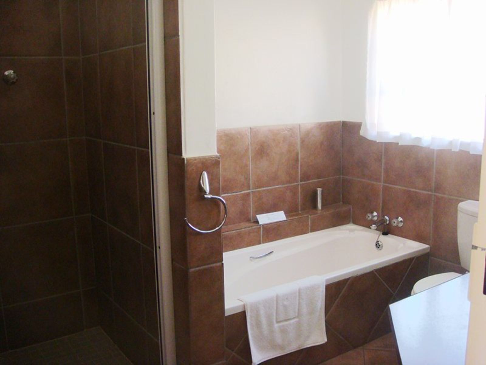 Rondreis Zuid-Afrika, Johannesburg, Avant Garde Lodge, badkamer