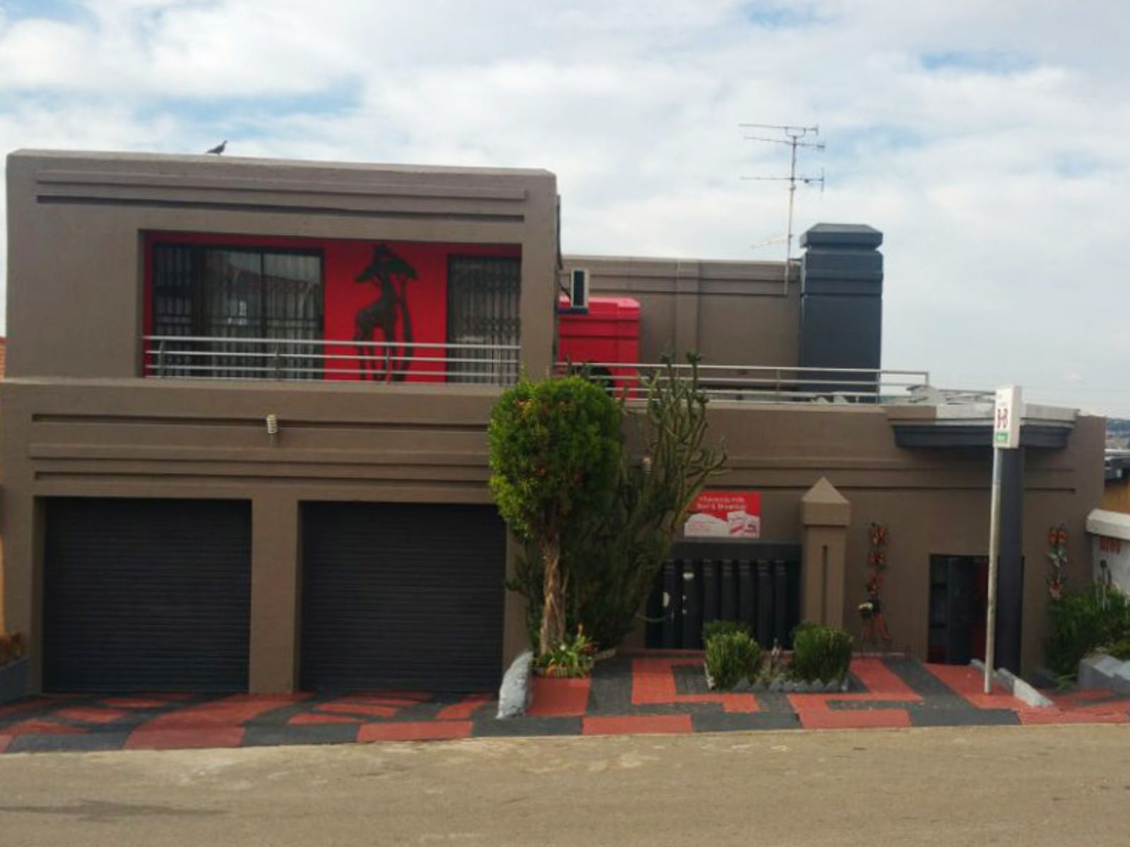 Rondreis Zuid-Afrika, Johannesburg-Soweto, Vahvenda Hills, buitenaanzicht hotel