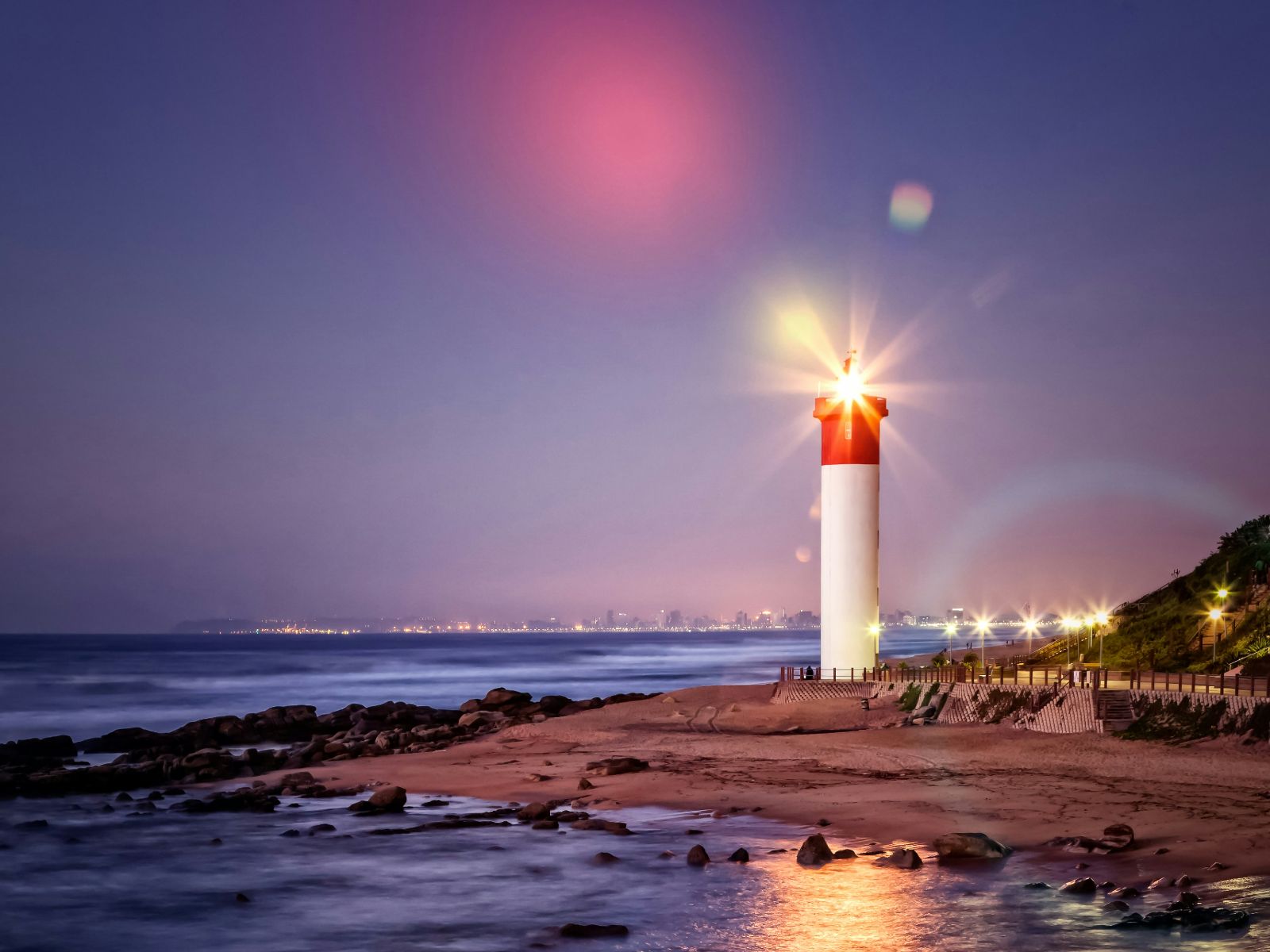 Rondreis Zuid- Afrika, Umhlanga Rocks, strand, zee, vuurtoren avond