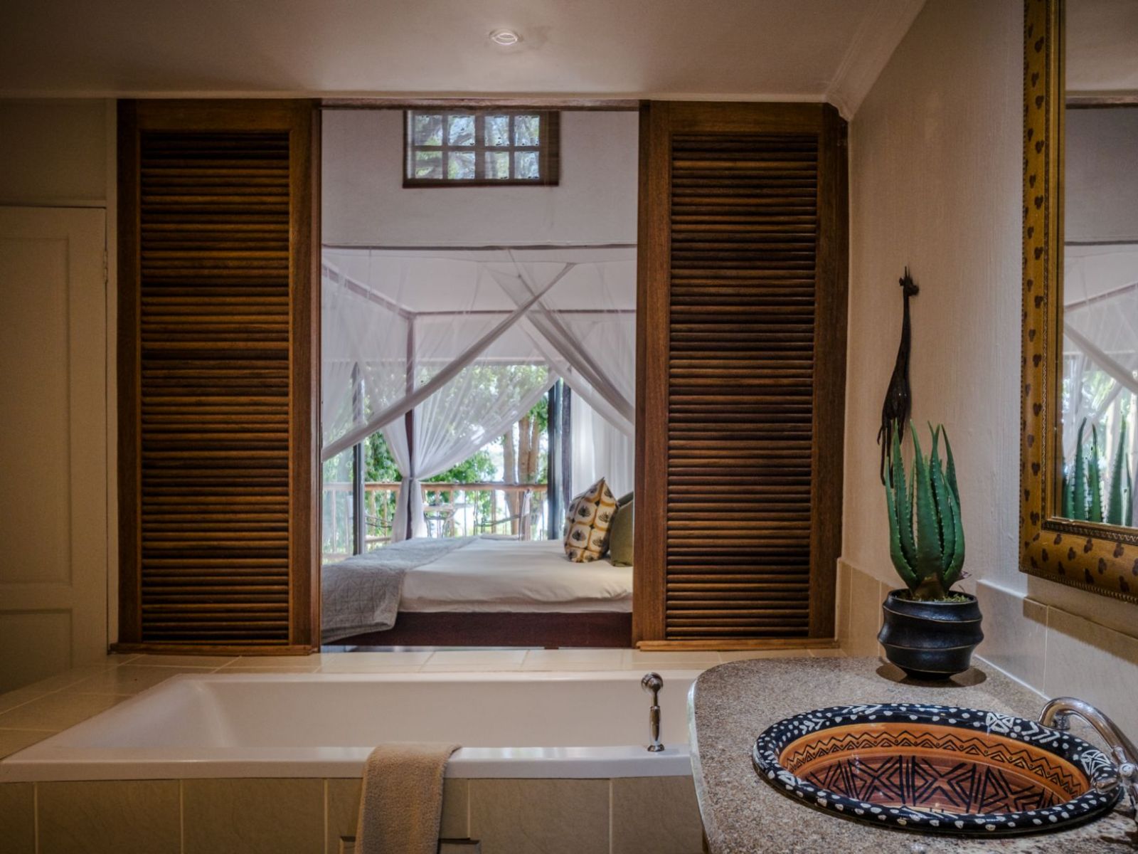 Rondreis Botswana, Ngoma Bridge, Chobe Marina Lodge, badkamer