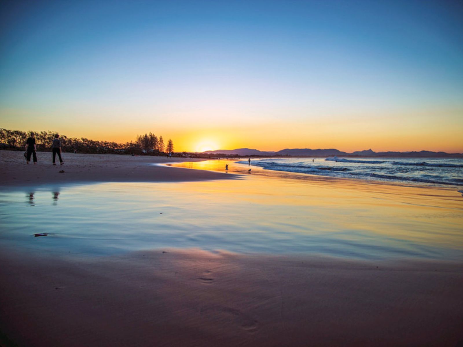Rondreis Seychellen, Silhouette, zonsondergang aan het strand