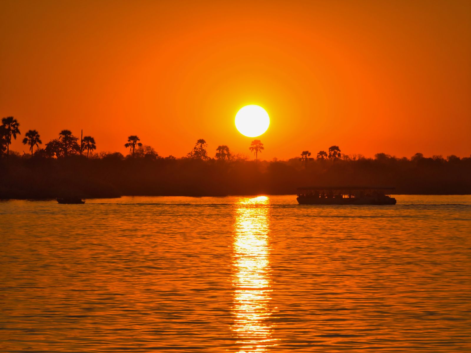 Rondreis Zimbabwe, Victoria falls, boottocht bij zonsondergang