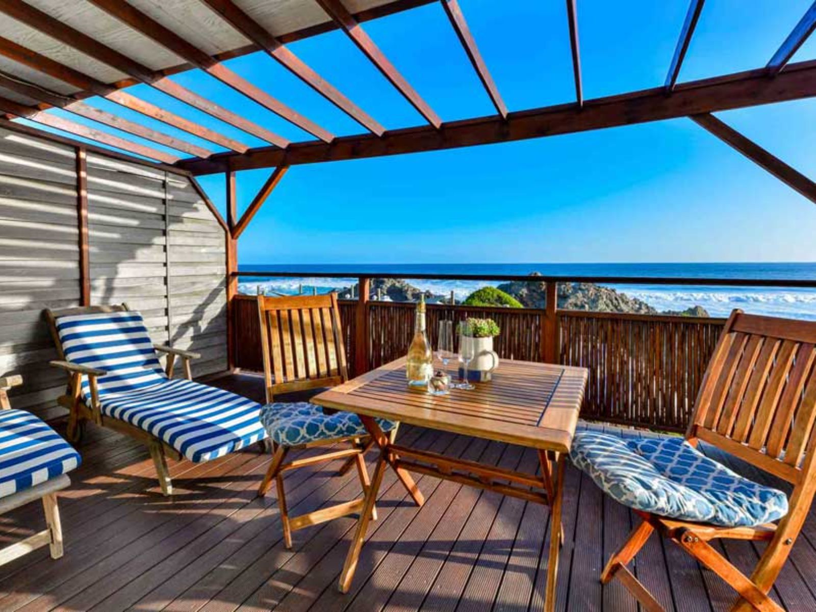 Rondreis Zuid-Afrika, Plettenberg Bay, Singing Kettle Beach Lodge, balkon
