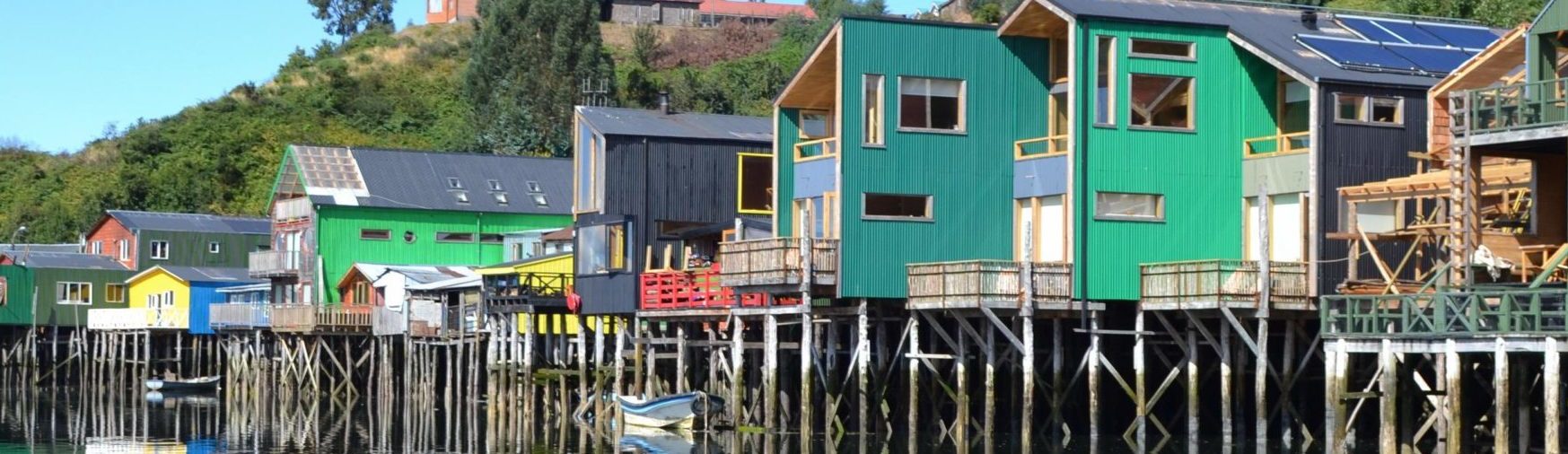 rondreis chili hoogtepunt chiloe paisaje palafito huizen op pale header