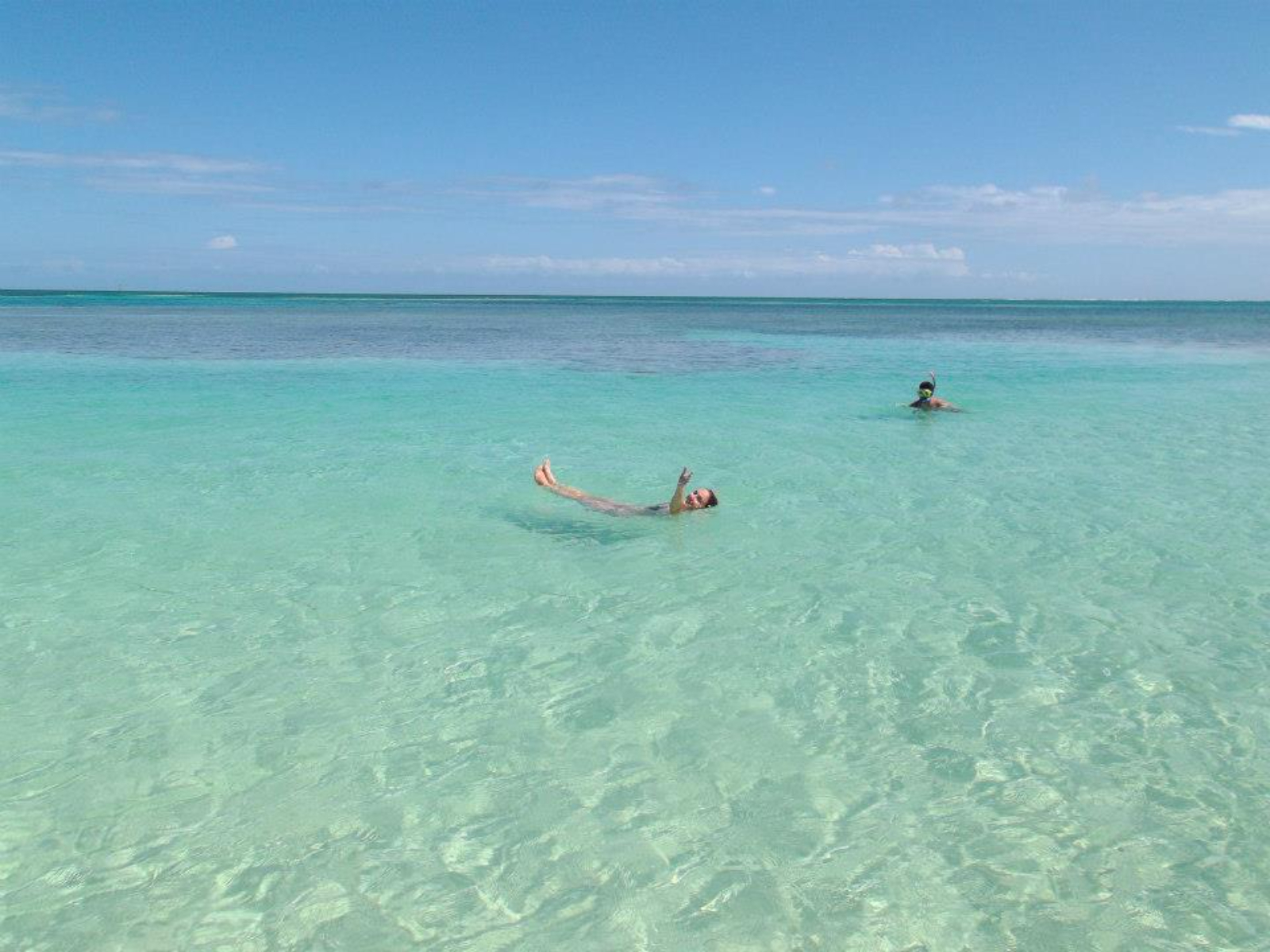Rondreis Belize, Caye Caulker, helder blauw water