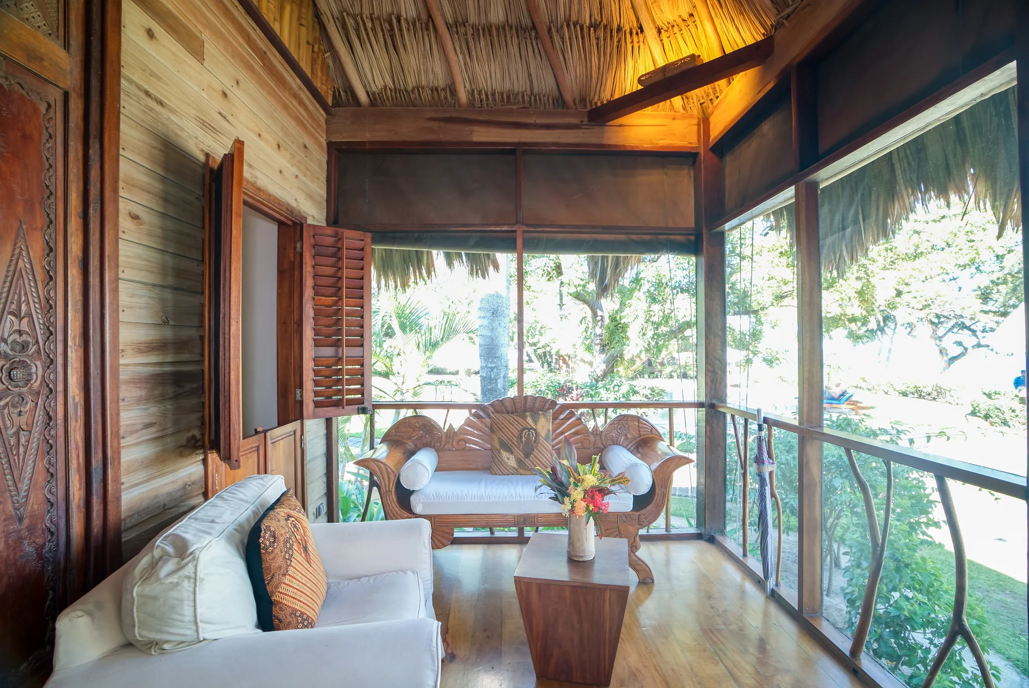 Rondreis Belize, Placenia, Turtles Inn, Garden View cottage, buiten terras