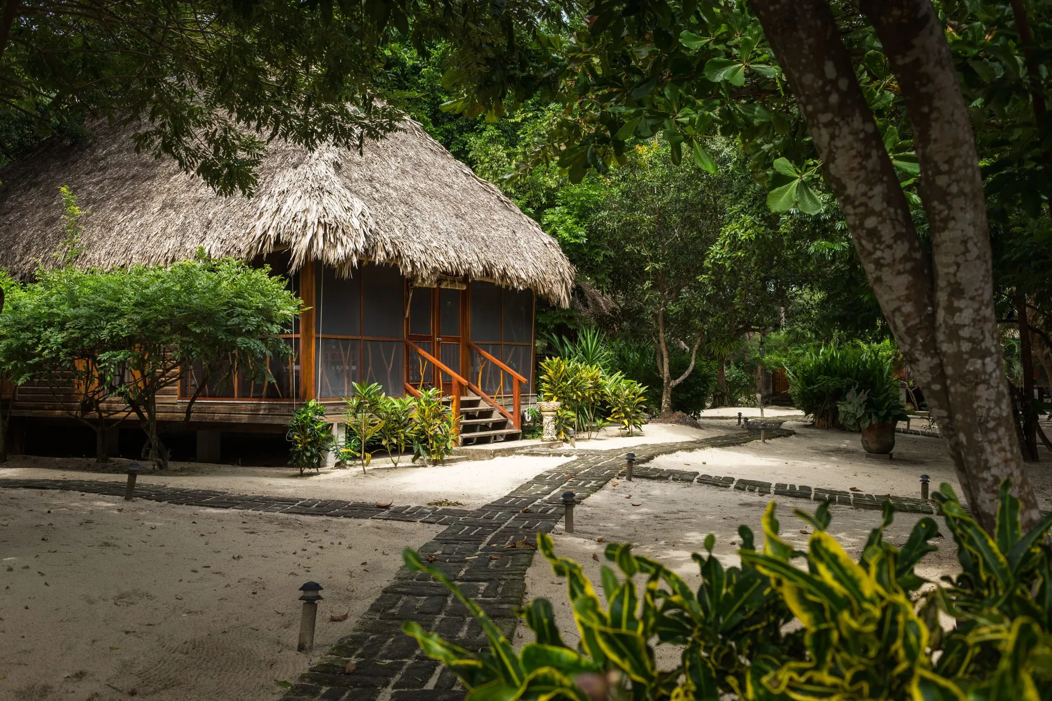 Rondreis Belize, Placenia, Turtles Inn, Garden View cottage buitenaanzicht