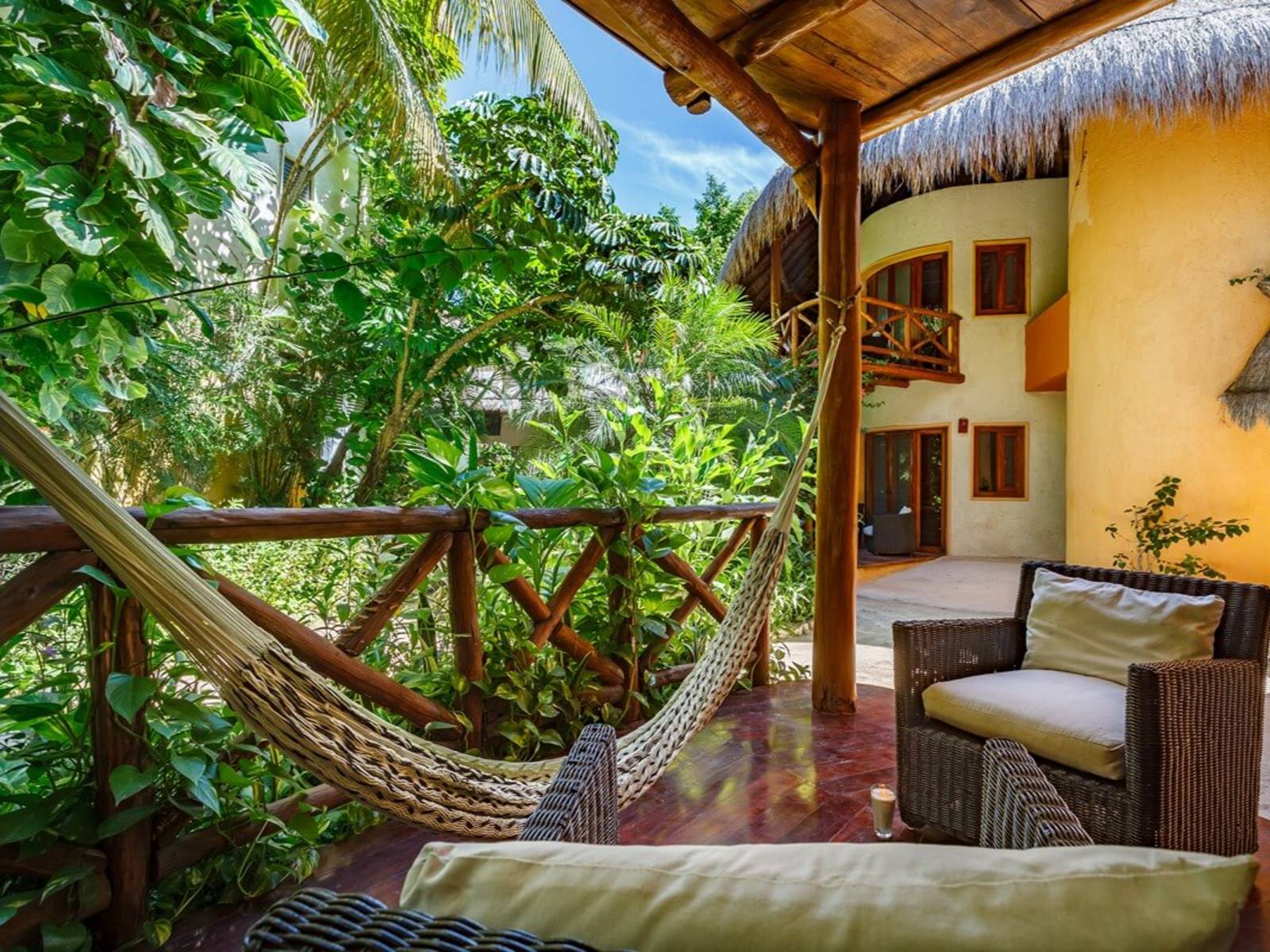 Rondreis Mexico, Isla Holbox, Villas Paraiso del Mar, terras met hangmat