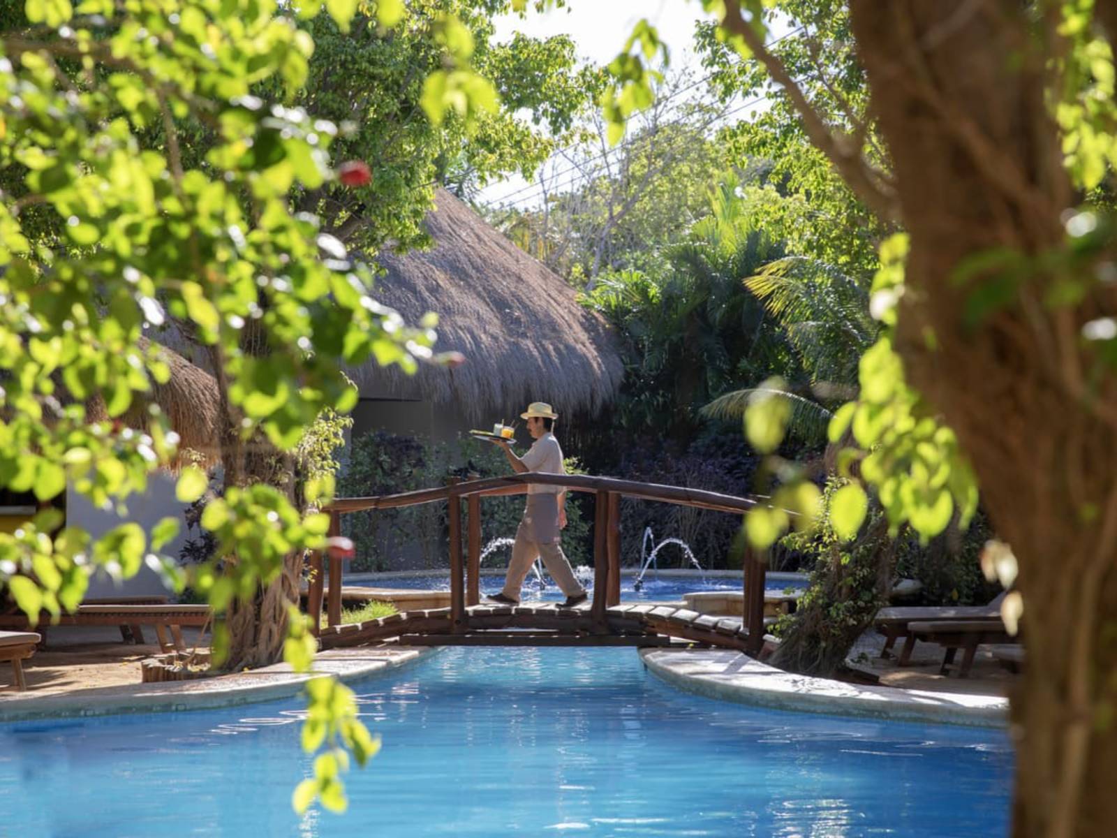 Rondreis Mexico, Isla Holbox, Villas Paraiso del Mar, zwembad bruggetje