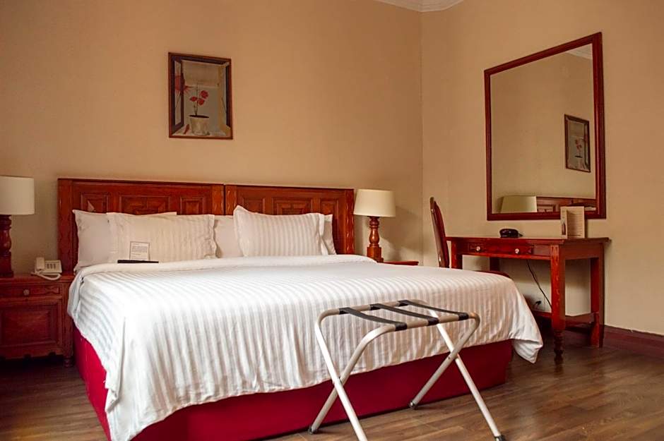 Rondreis Mexico, Mexico-Stad, Majestic Hotel, kamer bed