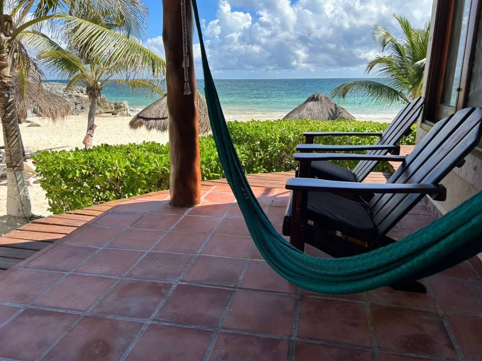 Rondreis Mexico, Tulum, Piedra Escondida, terras met hangmat