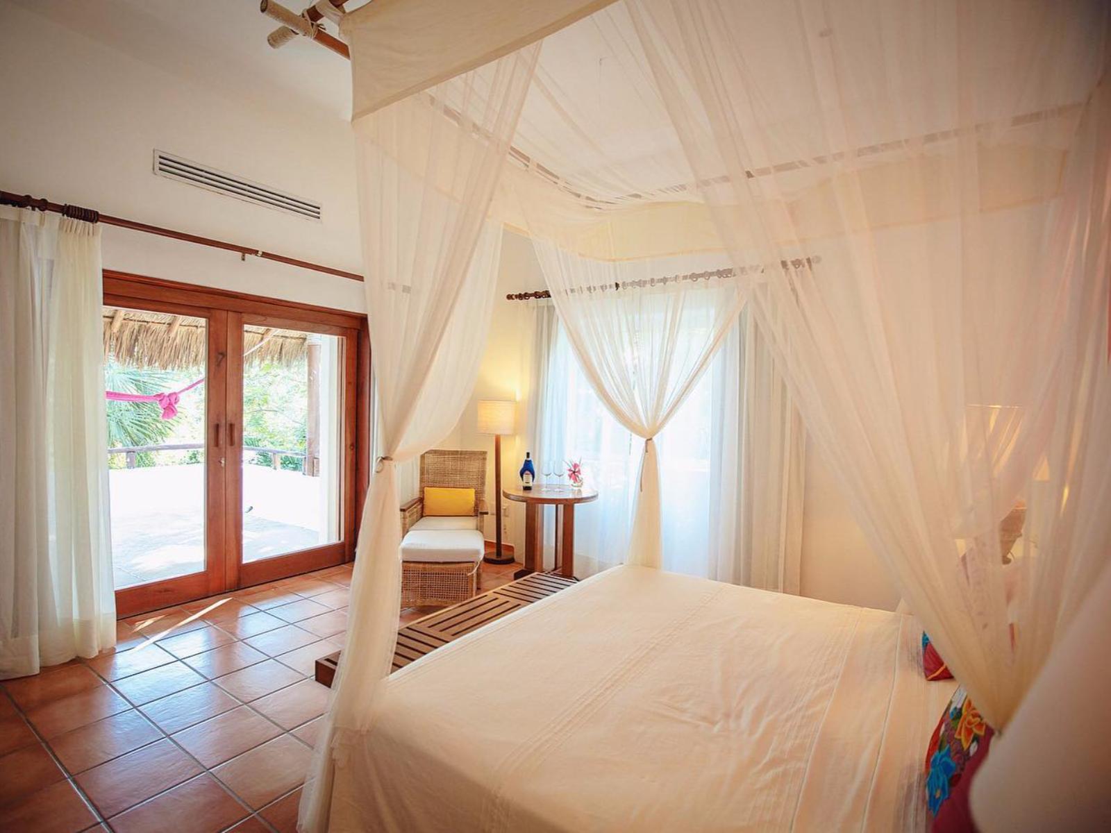 rondreis mexico - bacalar - rancho encantado hotel - slaapkamer