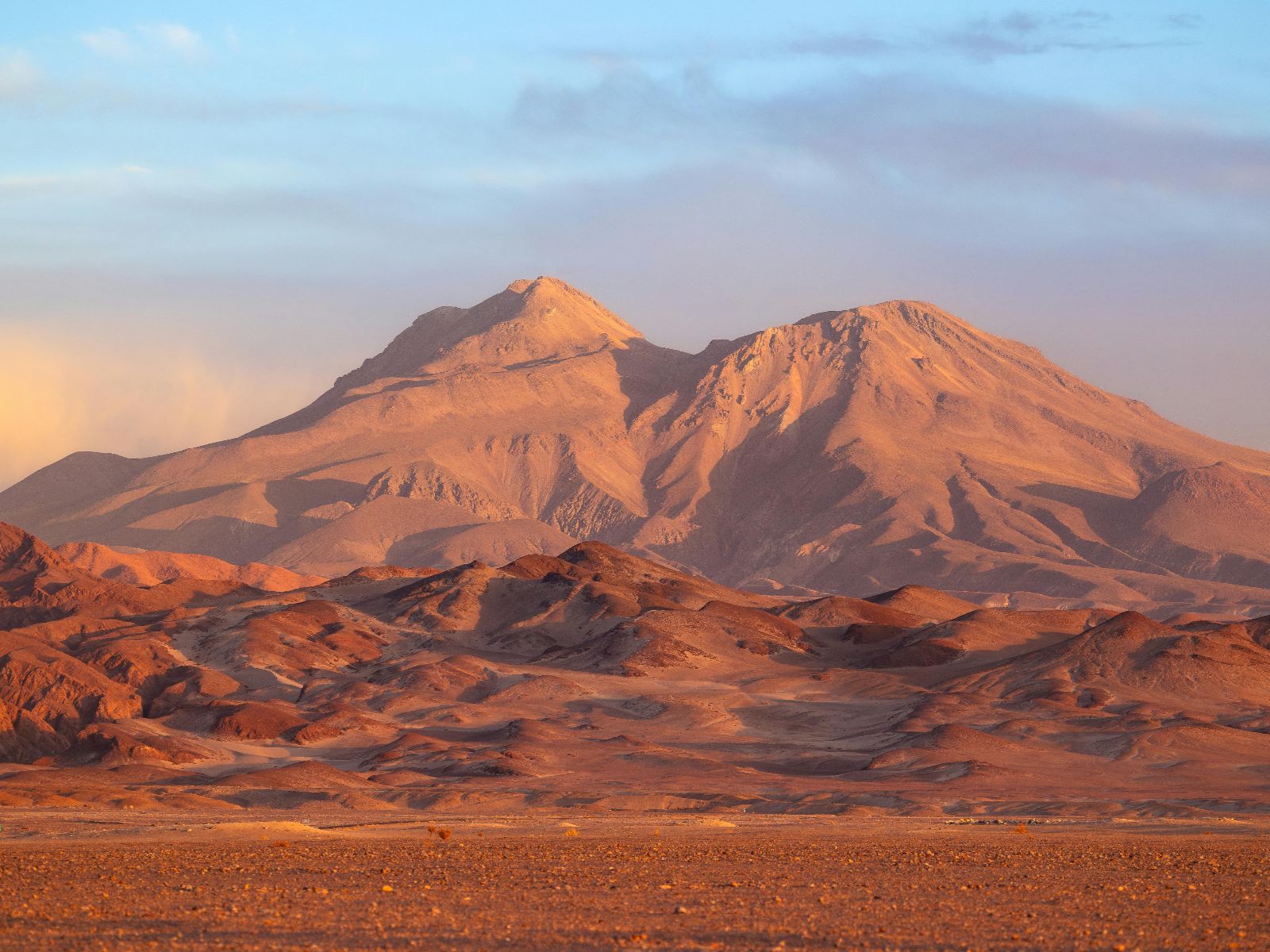 Rondreis Chili, San Pedro de Atacama, excursie sterrenkijken, landschap met oranje gloed