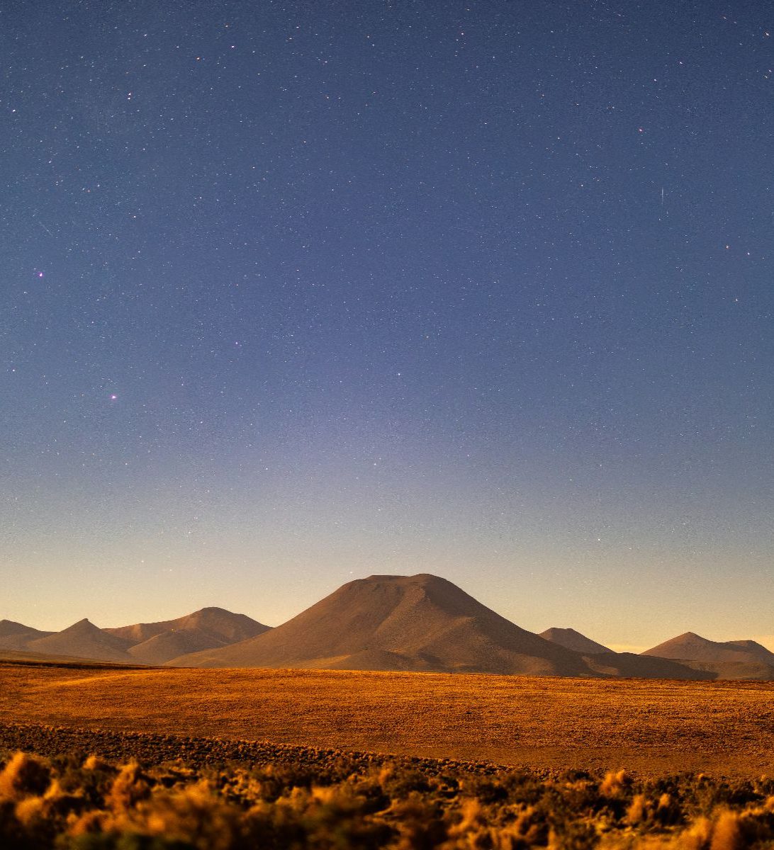 Rondreis Chili, San Pedro de Atacama, excursie sterrenkijken, landschap met zonsondergang