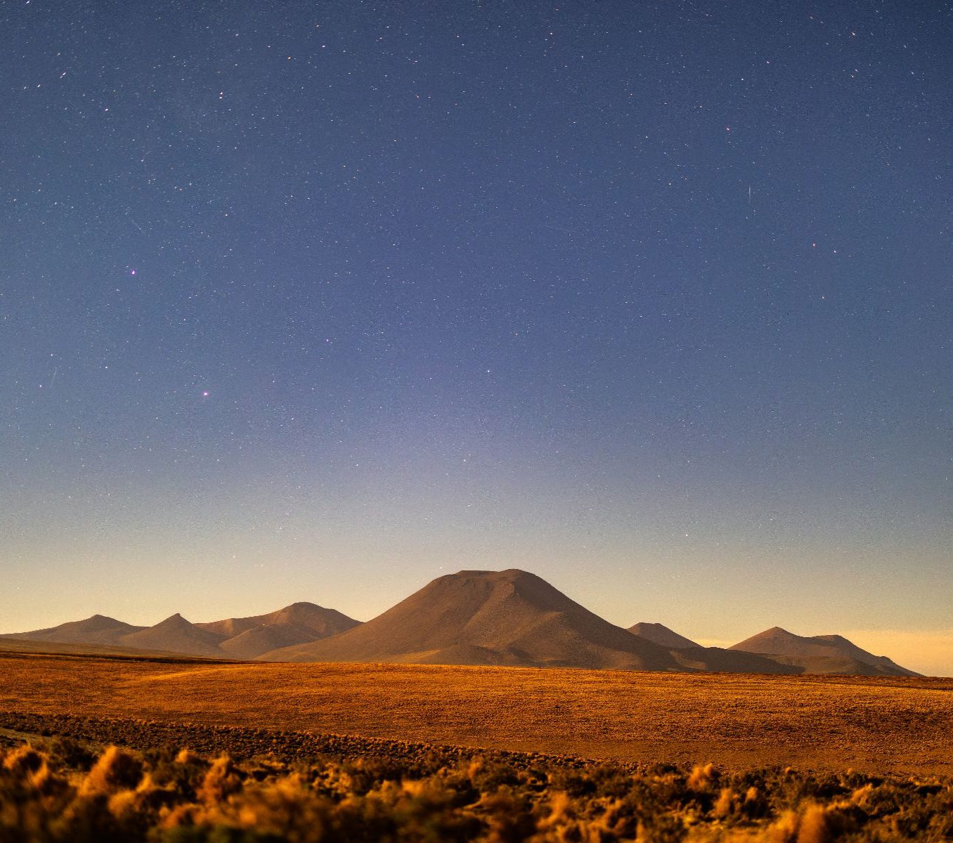 Rondreis Chili, San Pedro de Atacama, excursie sterrenkijken, landschap met zonsondergang