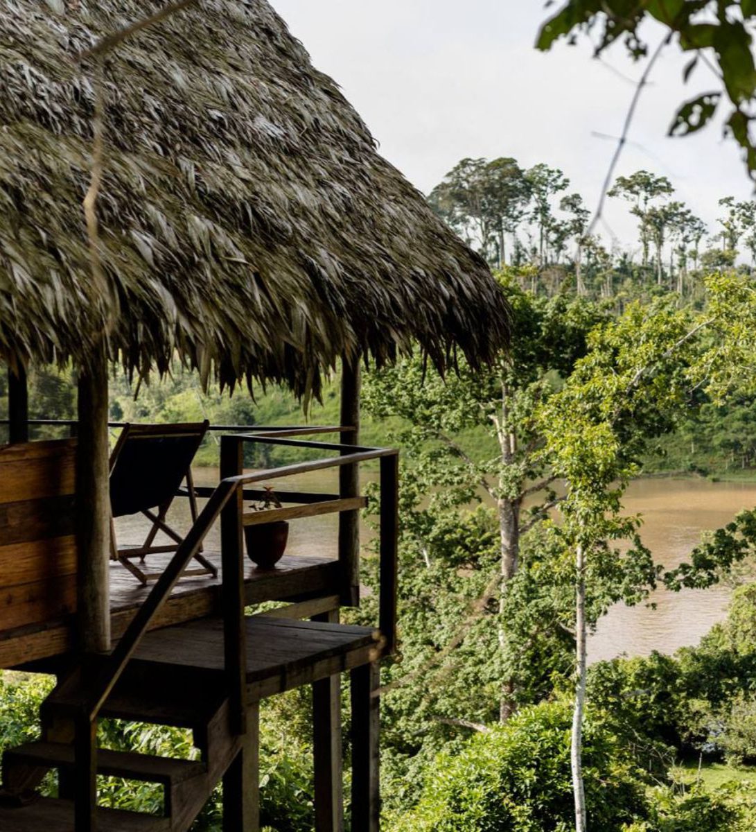 Rondreis Nicaragua, El Castillo, Guacimo Lodge, uitzicht vanuit lodge op het water en natuur