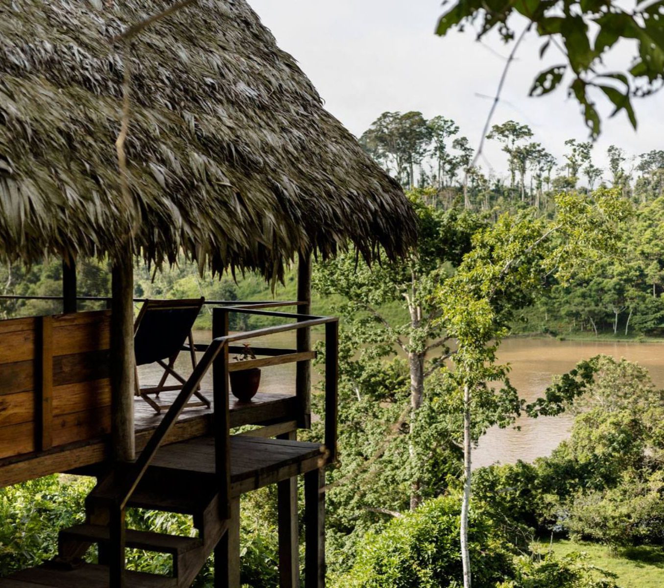 Rondreis Nicaragua, El Castillo, Guacimo Lodge, uitzicht vanuit lodge op het water en natuur