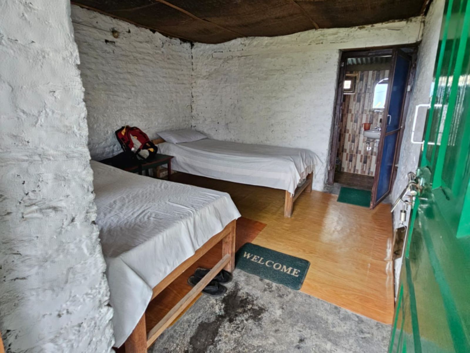 Rondreis Nepal, Trekking Lodges, kamer met bedden