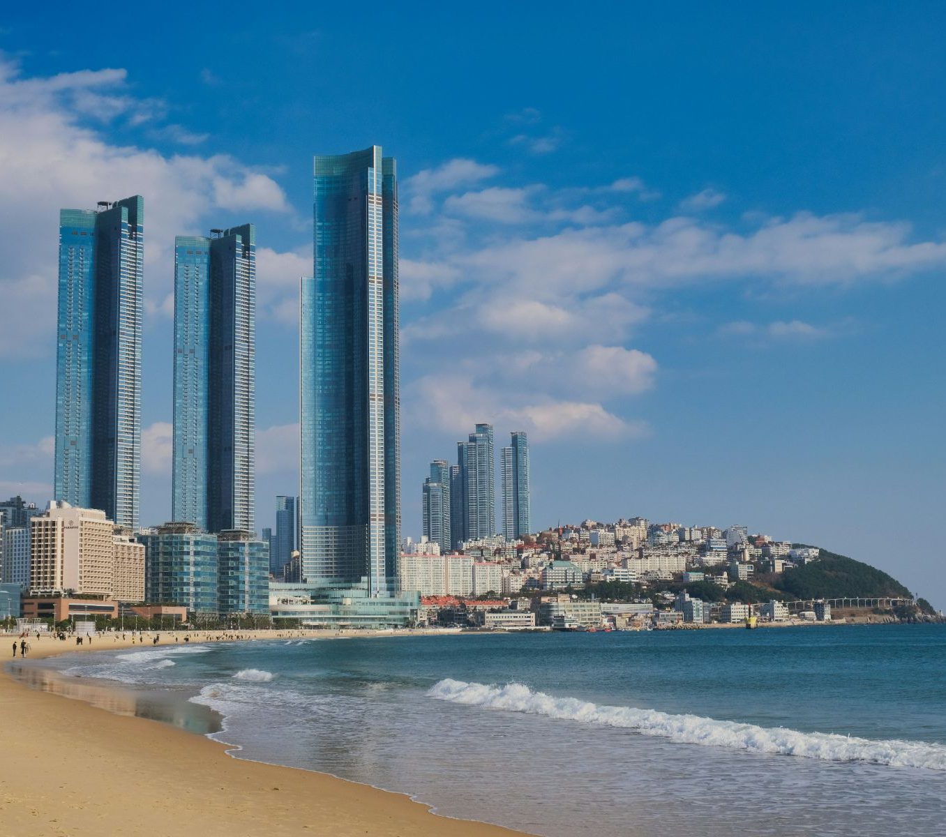 Rondreis Zuid-Korea, Busan, skyline met strand
