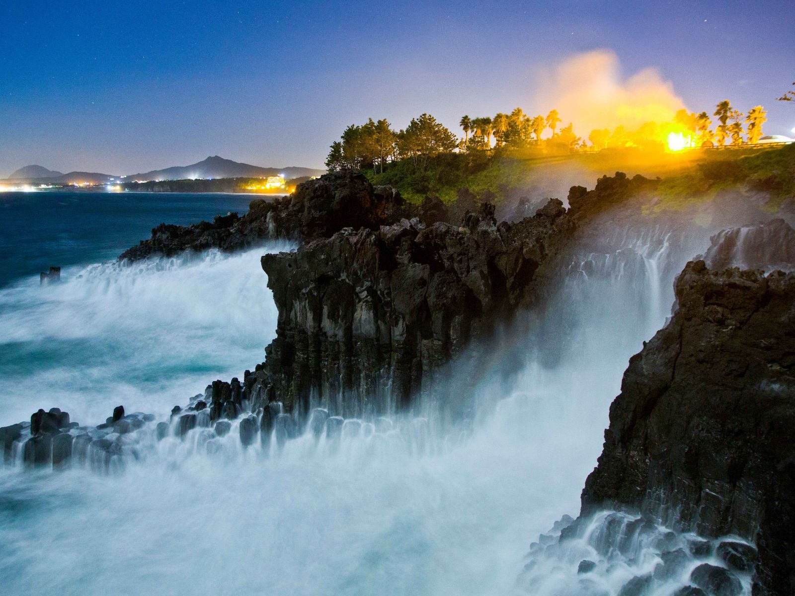 Rondreis Zuid-Korea, excursie Jeju Island westkust, ochtenzon bij Jusangjeolli Clif