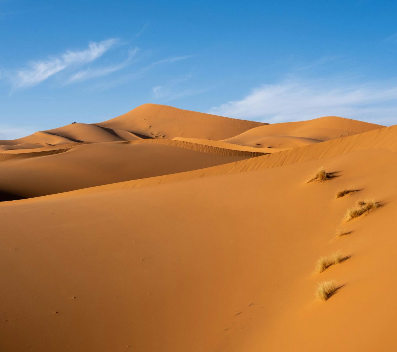 Rondreis Marokko, Erg Chegaga, woestijnen met de zon erop