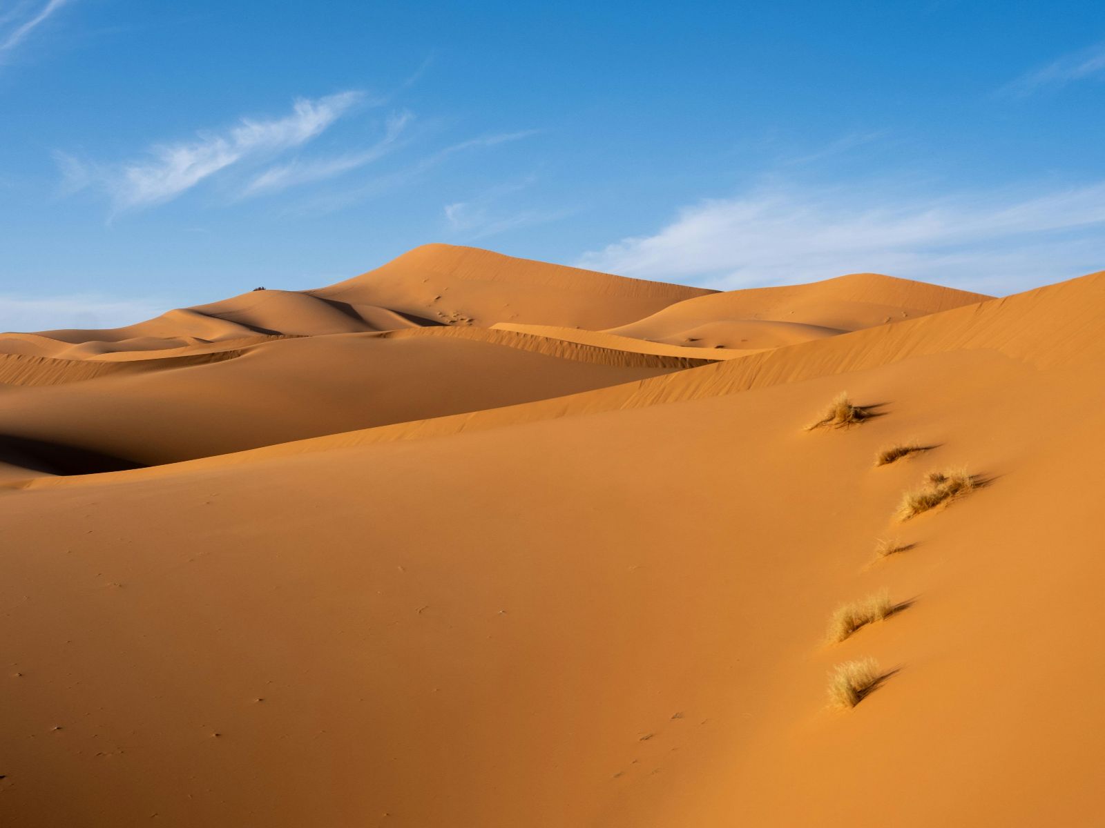 Rondreis Marokko, Erg Chegaga, woestijnen met de zon erop