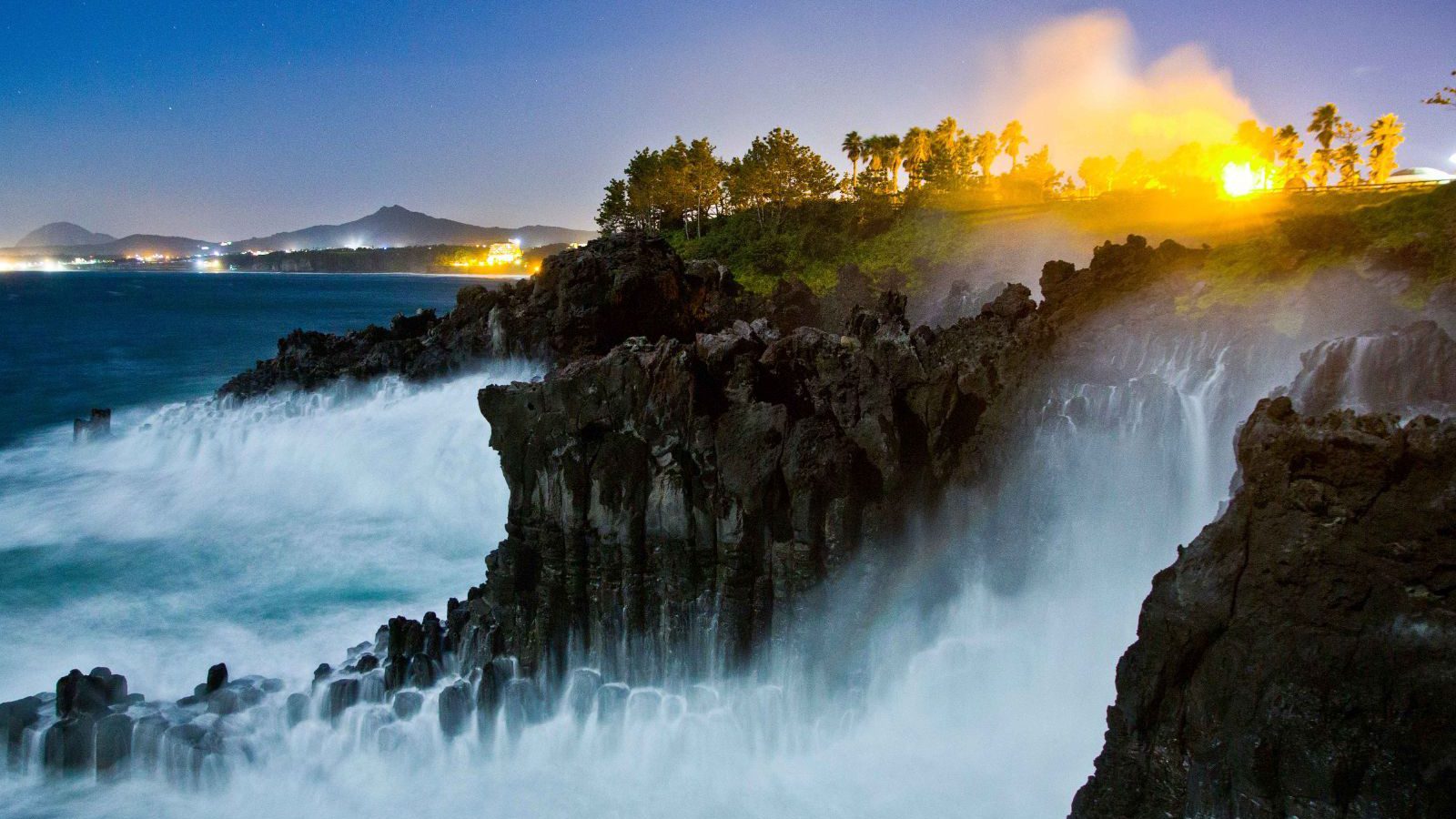 Rondreis Zuid-Korea, excursie Jeju Island westkust, ochtenzon bij Jusangjeolli Clif