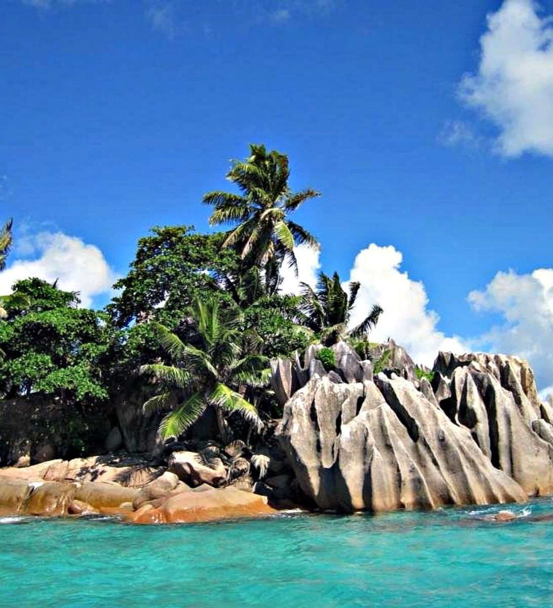 Rondreis Seychellen, Praslin, excursie eilandhoppen Cousin Curieuse St Pierre, eiland vanaf water Rondreis Seychellen, Praslin, excursie eilandhoppen Cousin Curieuse St Pierre, eiland vanaf water